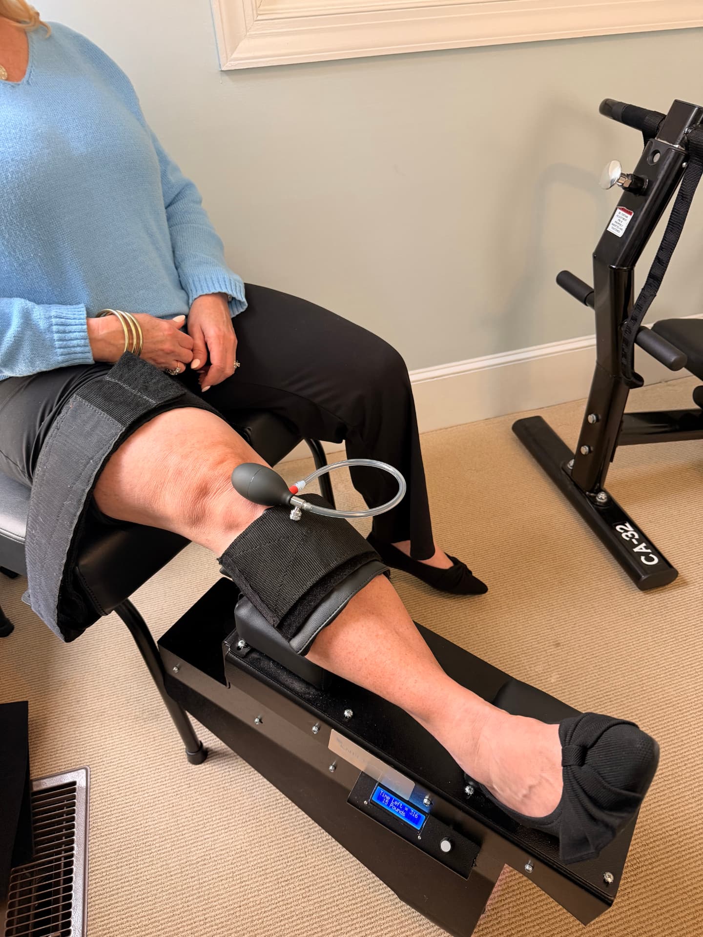 Close-up of the Knee on Trac system in a treatment room at Allt House